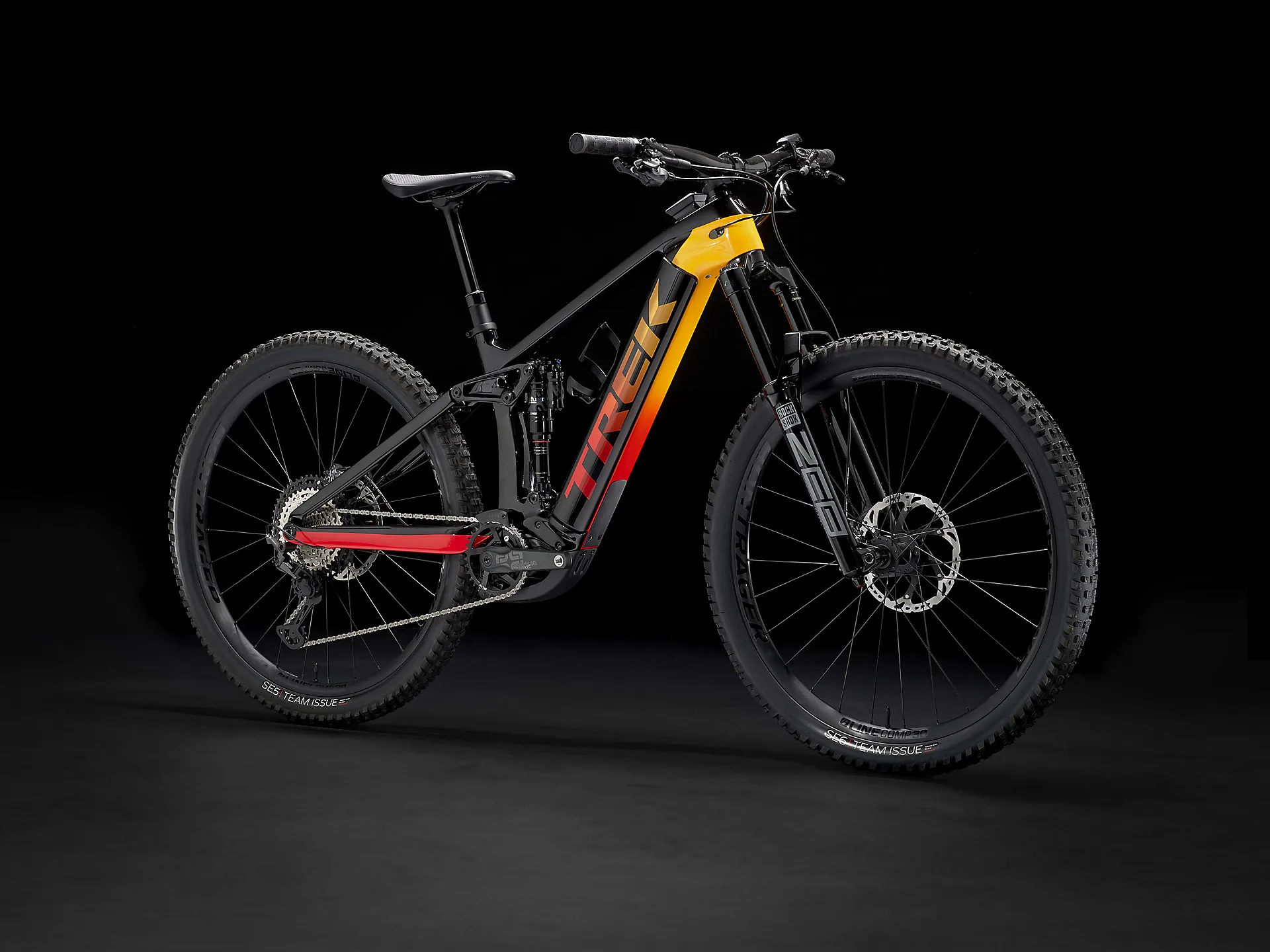 Trek Rail XT eMountain Bike in Black/Marigold to Red Fade